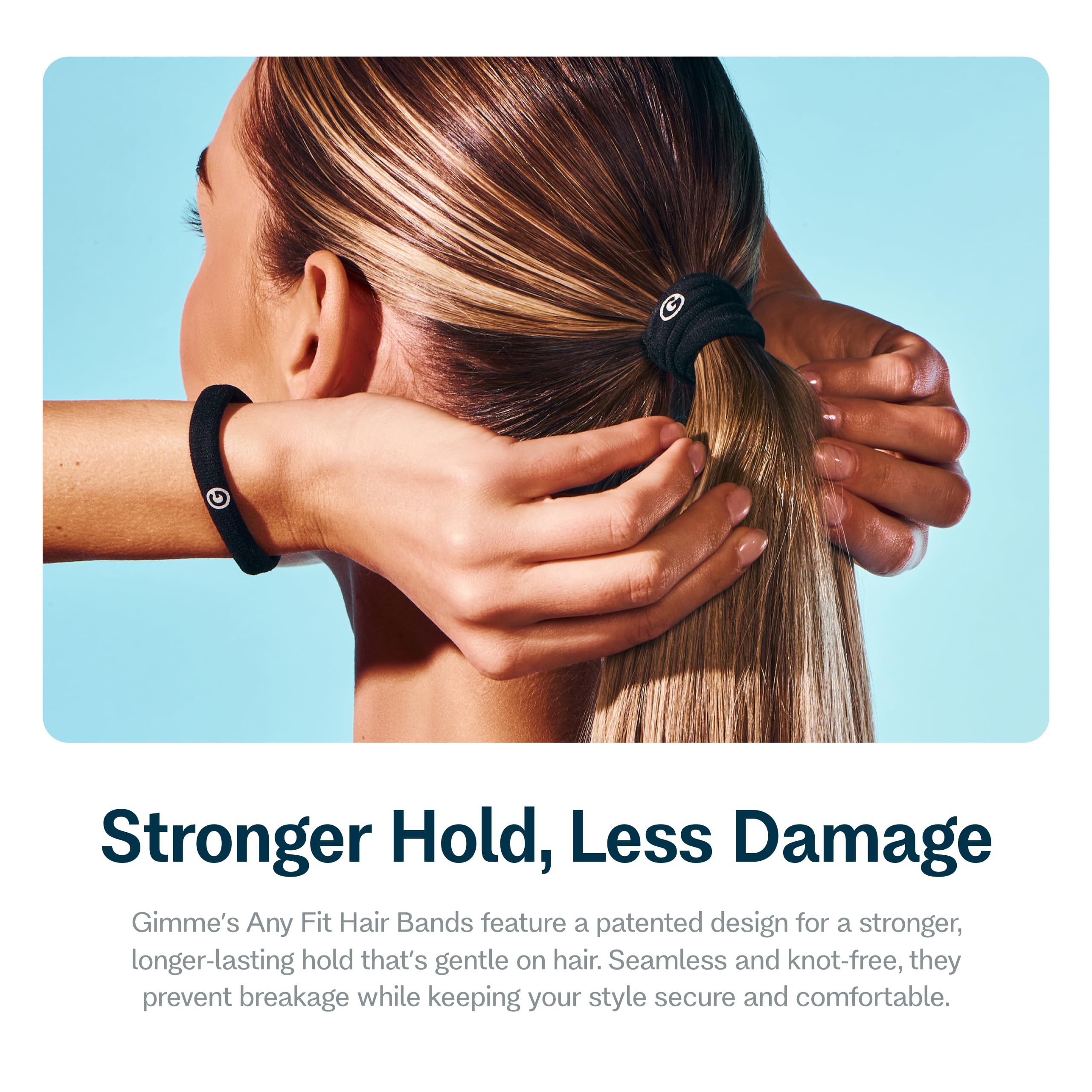 Damage free ponytail holder being stretched to demonstrate elasticity bounce back