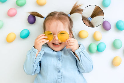 CÃ‰LLOT brand toddler hair accessories showing the thickness and seamless design of the elastic circular loops.