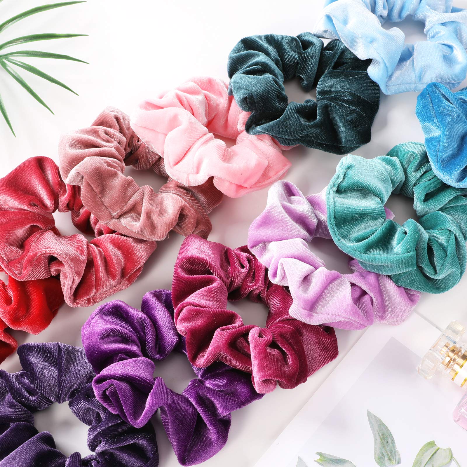 Assorted dark colors including shades of blue brown black and red velvet scrunchies.
