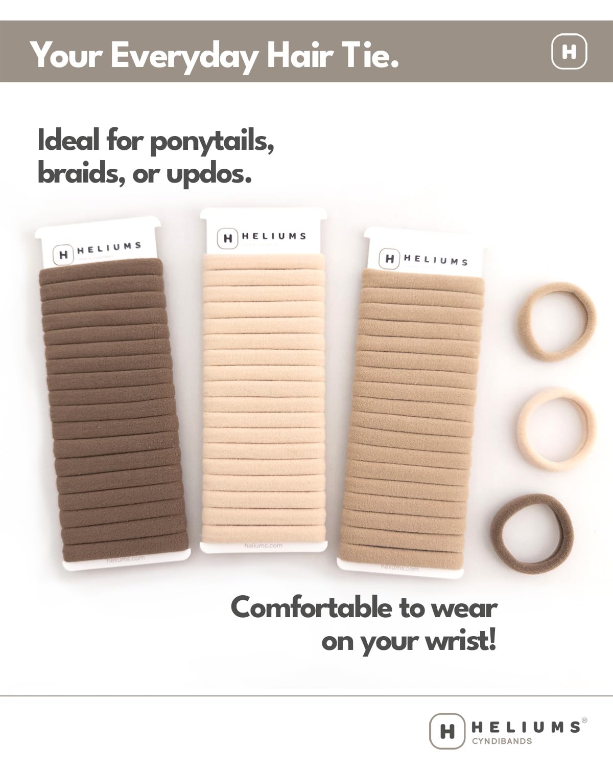 Heliums neutral colored hair ties spread out illustrating the seamless fabric texture.