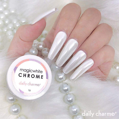 Professional application of Daily Charme chrome powder on manicure