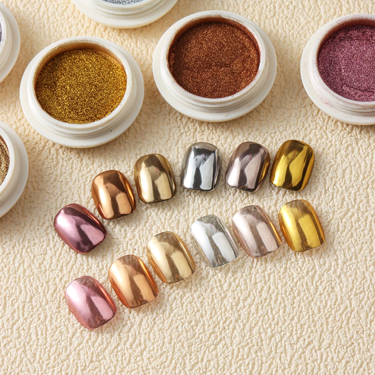 Holographic chrome powder shades including rose gold and silver
