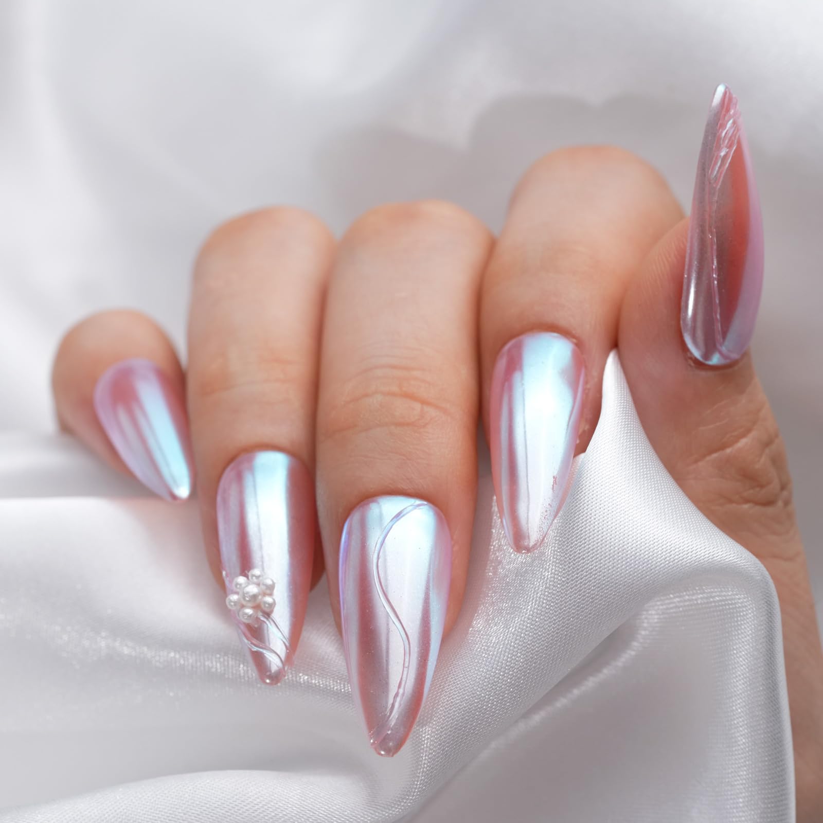 Application of Pretty Diva chrome powder on gel manicure
