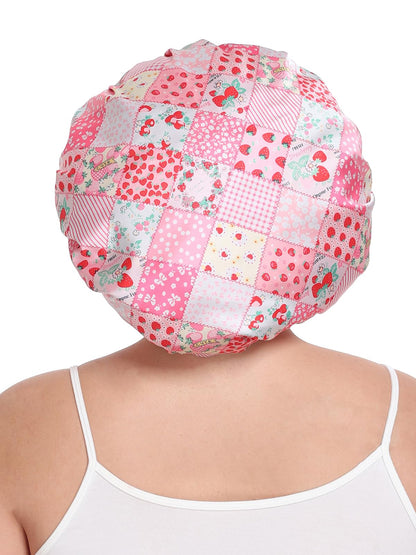 Vettres packaging content displaying the floral strawberry pink satin night cap alongside the separate matching eye mask.