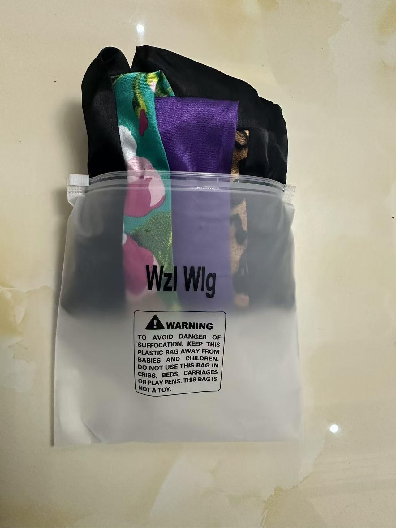 Packaging layout of the imported 4-pack hair protection accessories for overnight care.