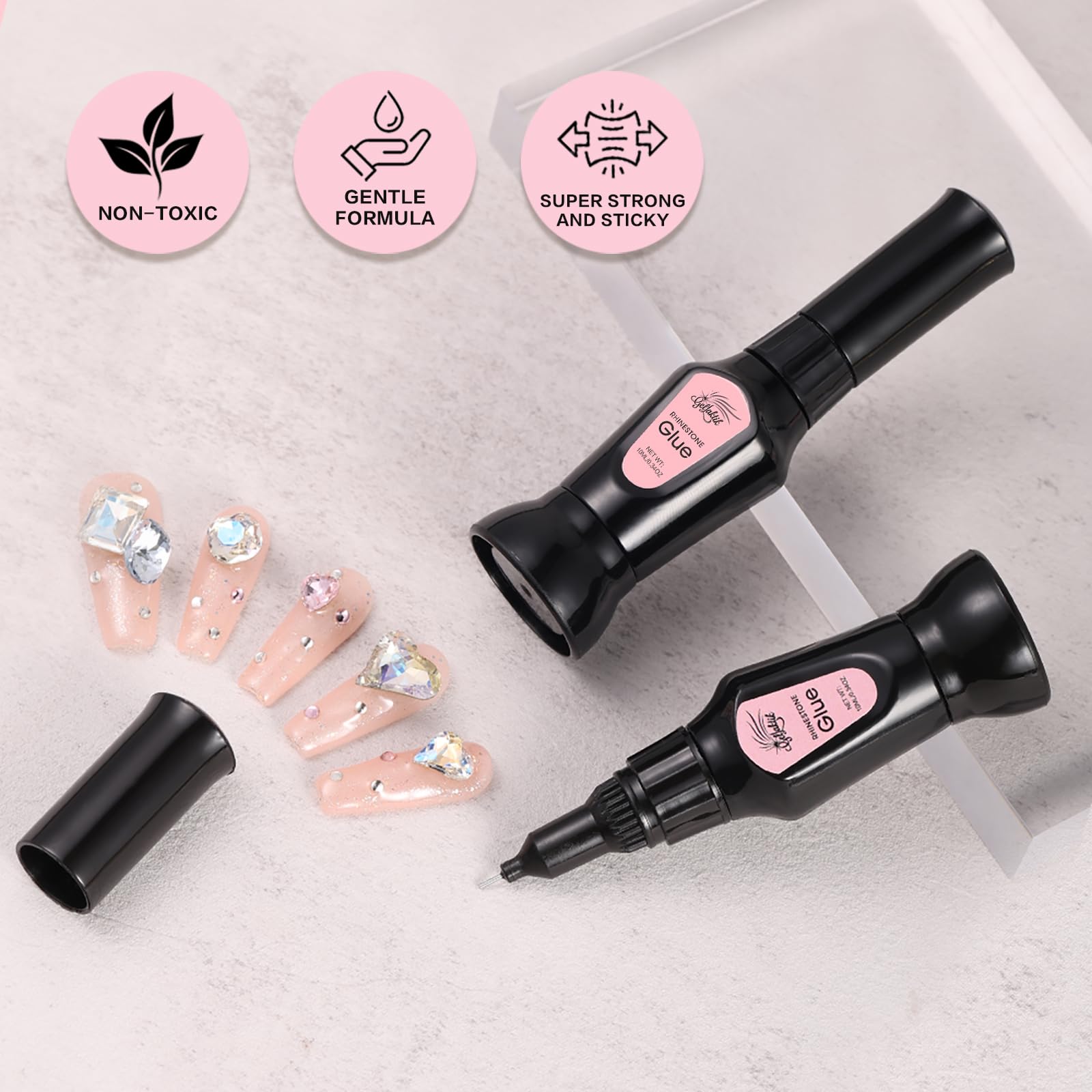 Brille Bee Gellaktik nail glue bottles on display