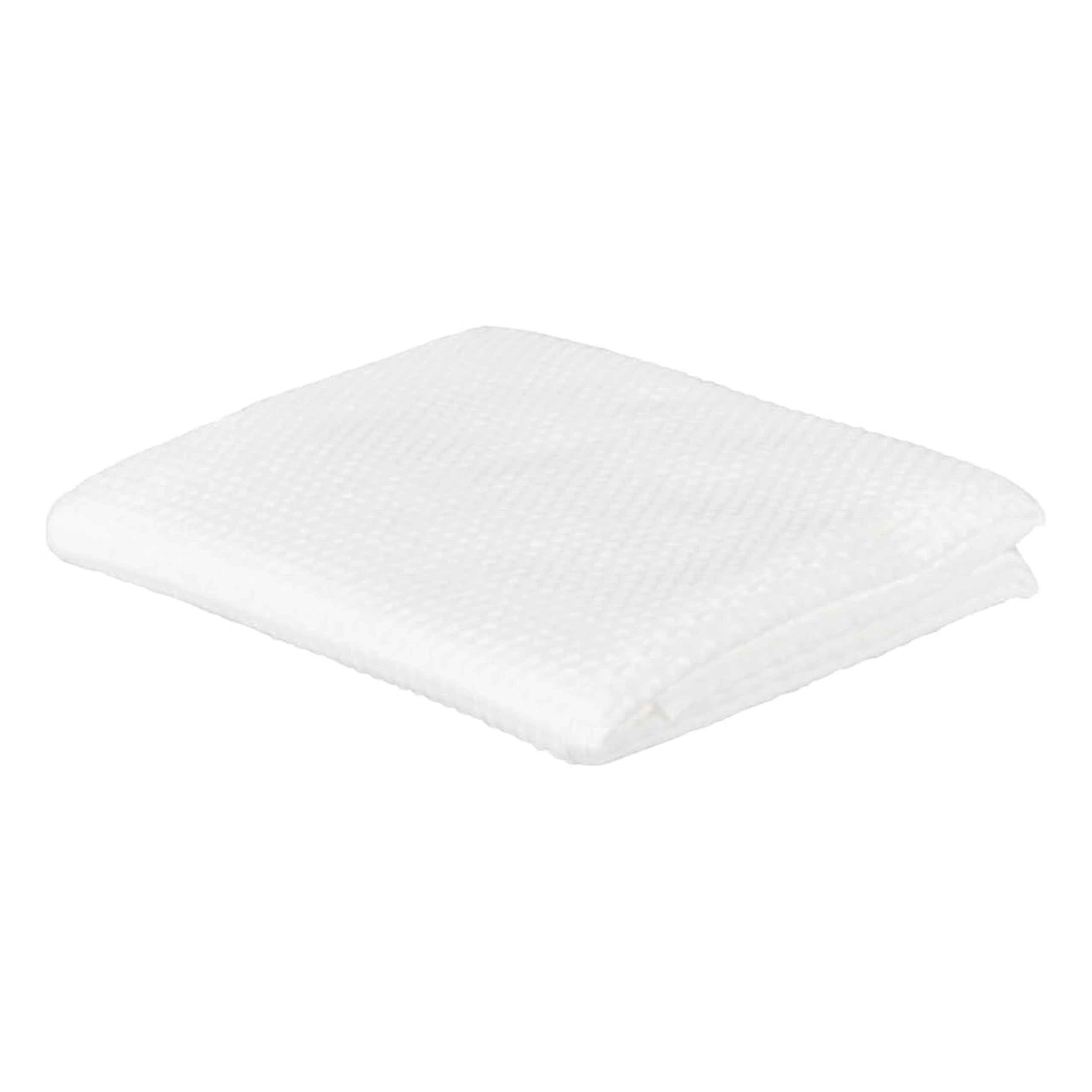Extra large disposable white towels laid out flat showcasing texture