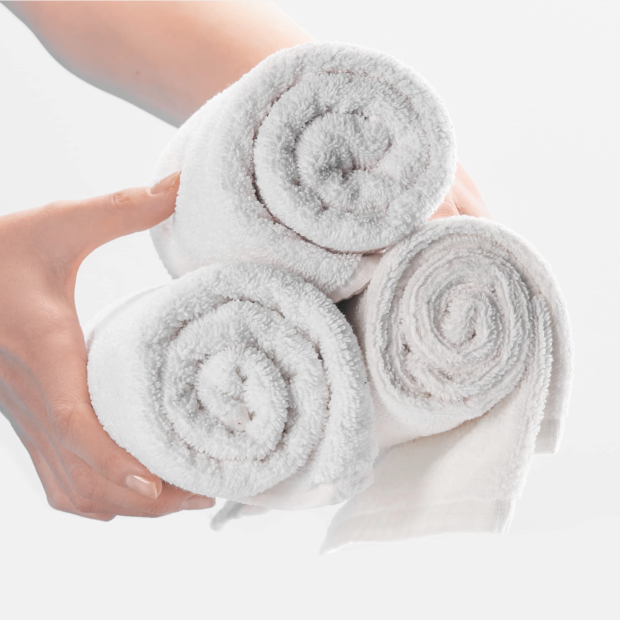Twelve by twenty seven inch black barber towels bundle close up