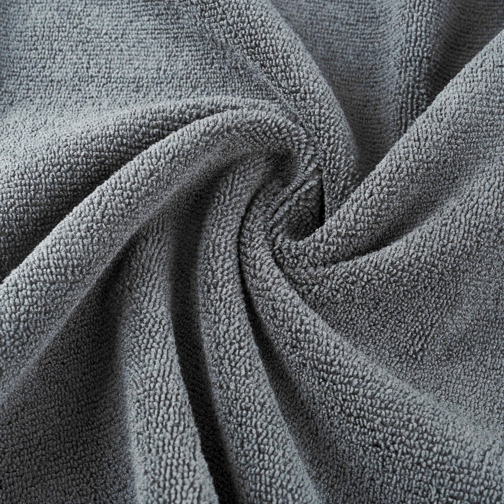 Two pack of gray MICROFI quick dry hair towels folded neatly together.