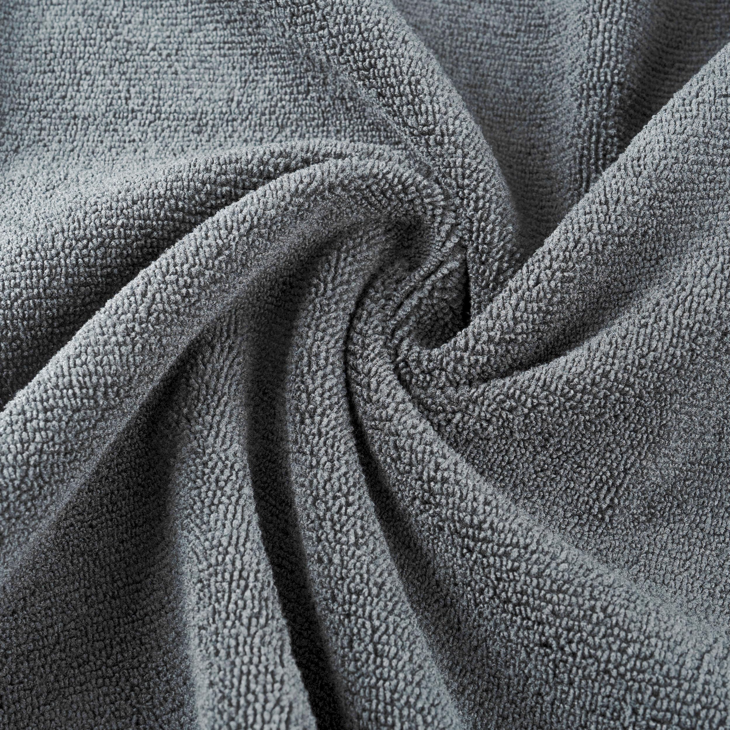 Two pack of gray MICROFI quick dry hair towels folded neatly together.