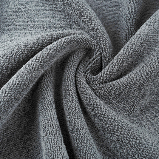 Two pack of gray MICROFI quick dry hair towels folded neatly together.