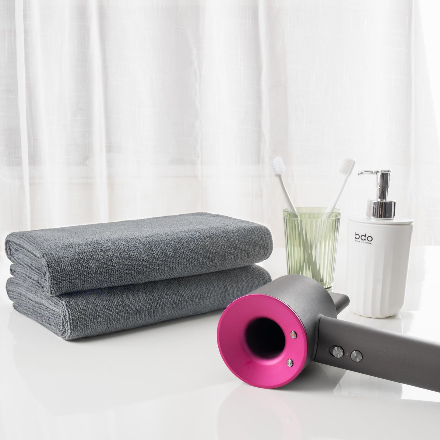 MICROFI gray hair drying towel laid flat highlighting the twenty by forty inches dimensions.
