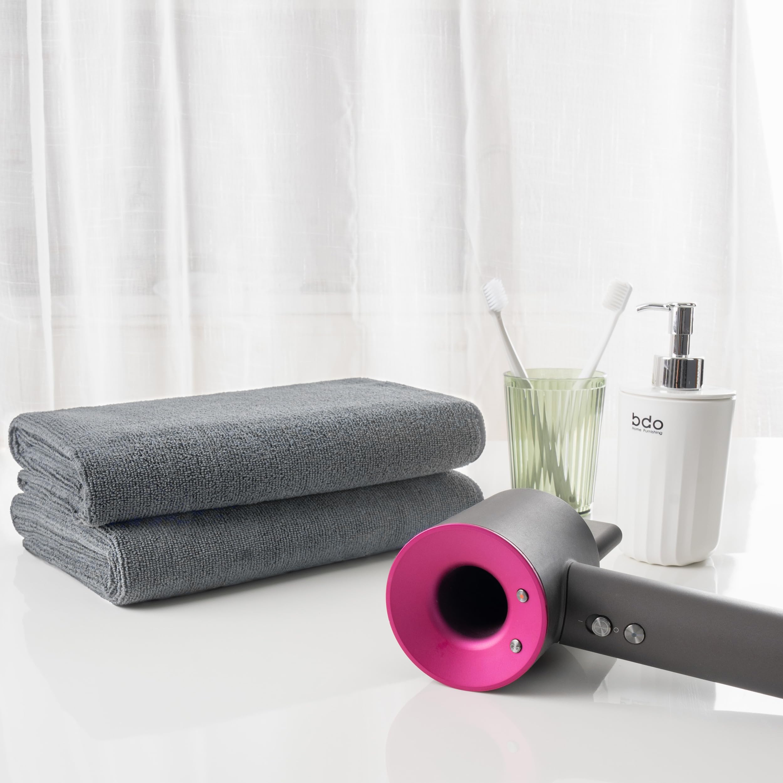 MICROFI gray hair drying towel laid flat highlighting the twenty by forty inches dimensions.
