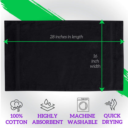 Folded stack of 100 percent cotton black spa towels