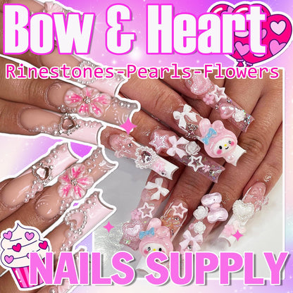 Pink and white bow and pearl nail art charms in storage box