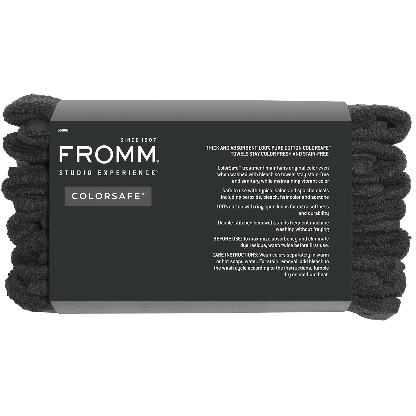 Professional hairstylist using Fromm black cotton salon towel