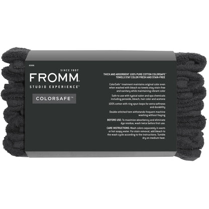 Professional hairstylist using Fromm black cotton salon towel