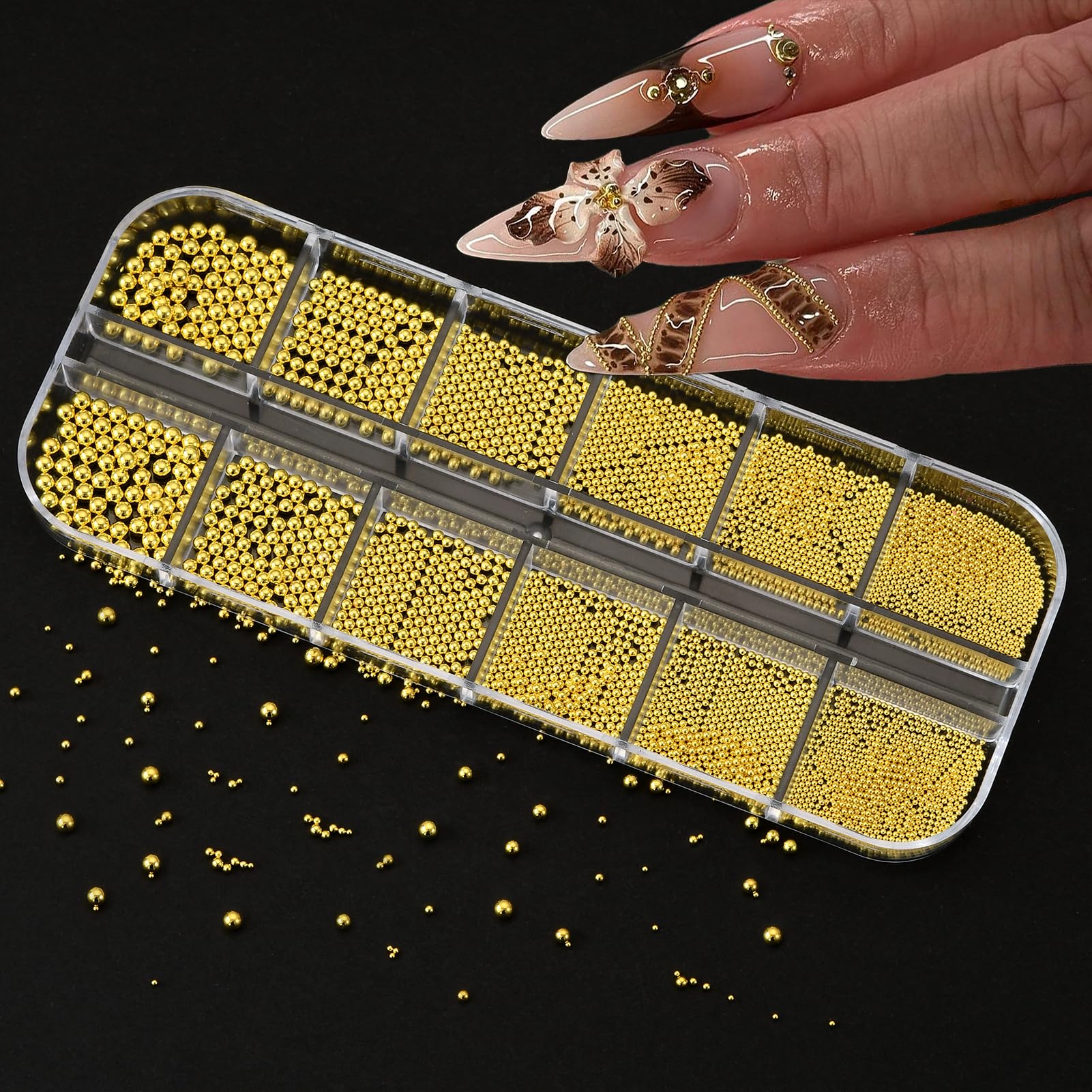 Individual compartments inside the gold nail charms storage case