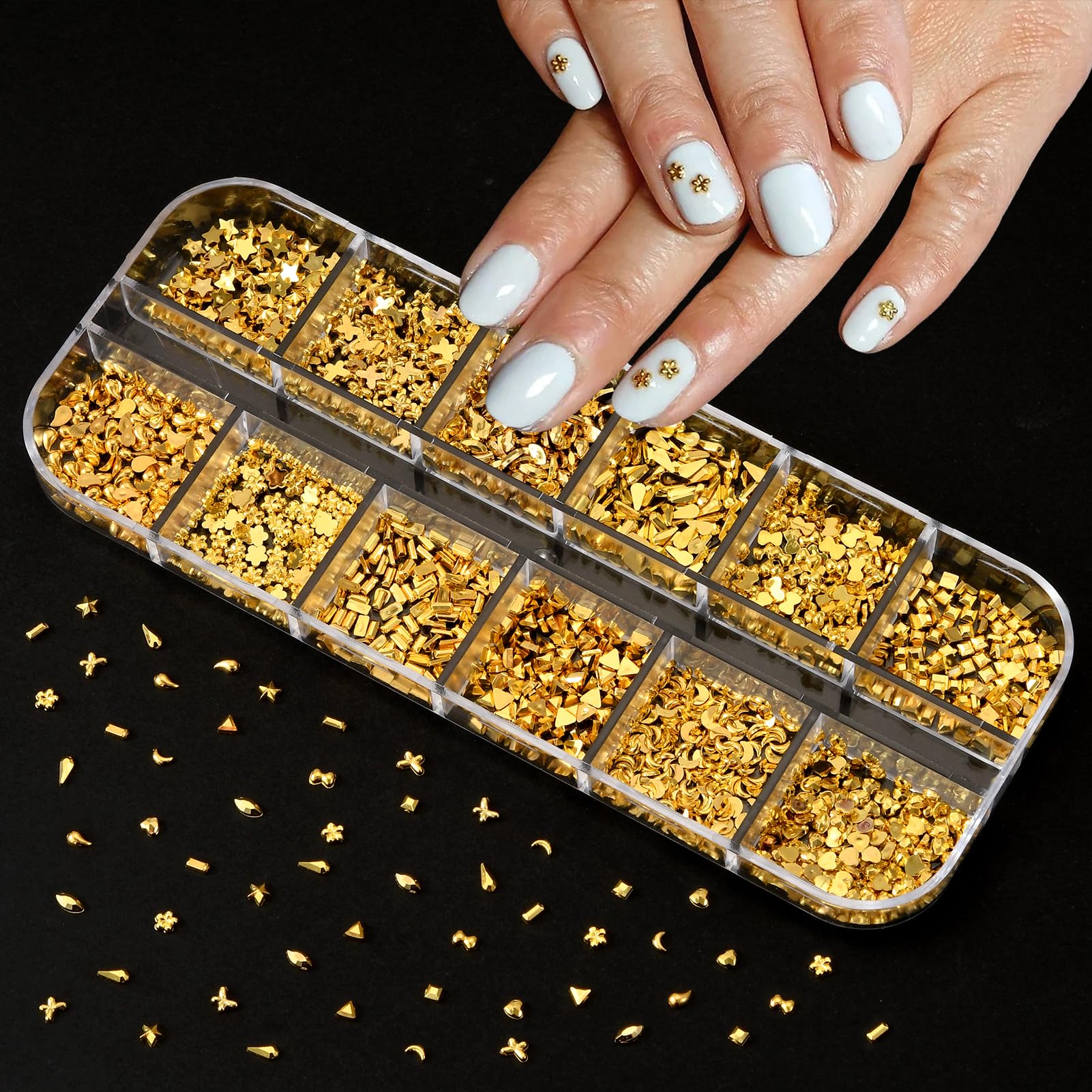 Top down view of variety of nail gems and pearl decorations