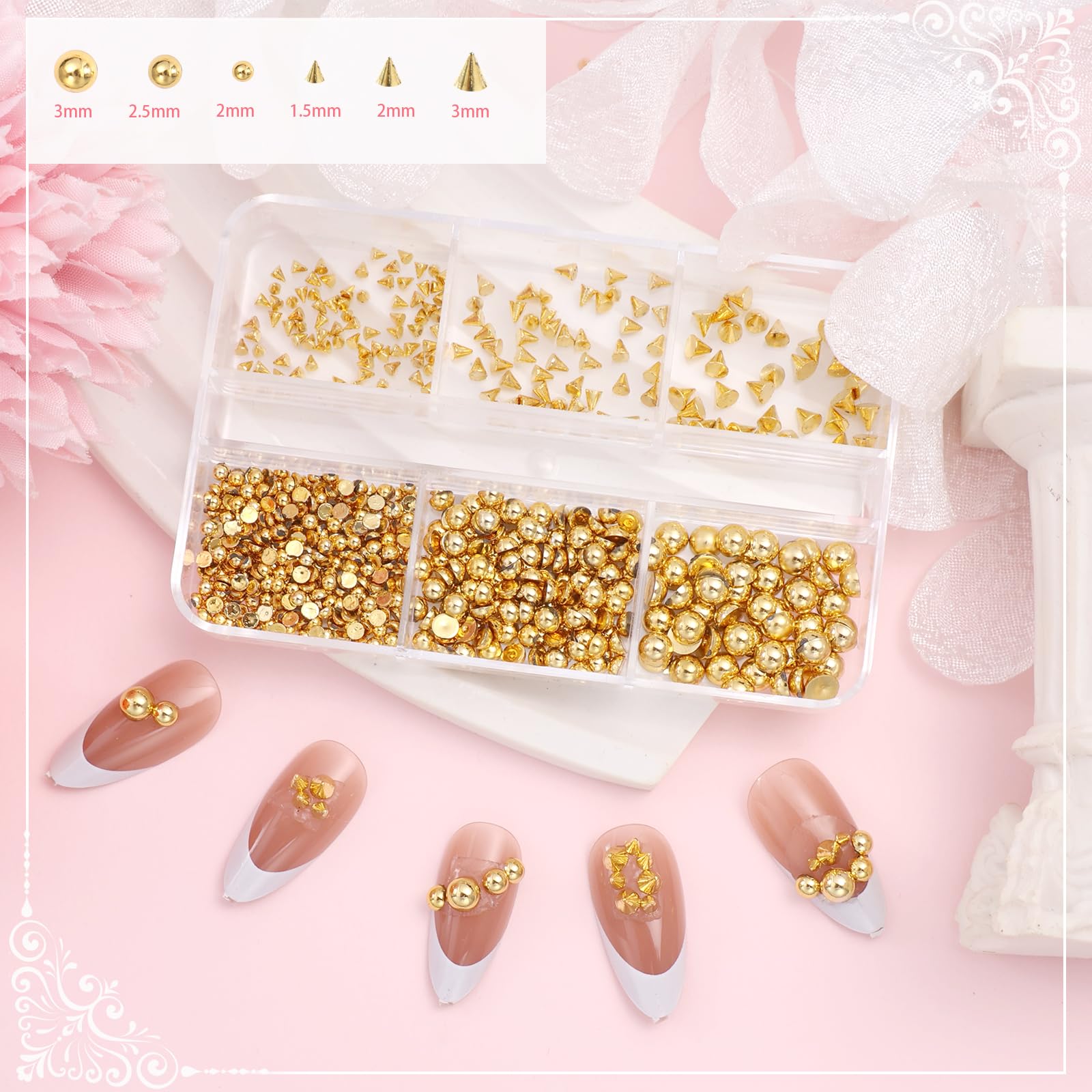 Close up of gold star and cross nail charms