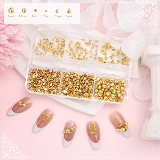 Close up of gold star and cross nail charms