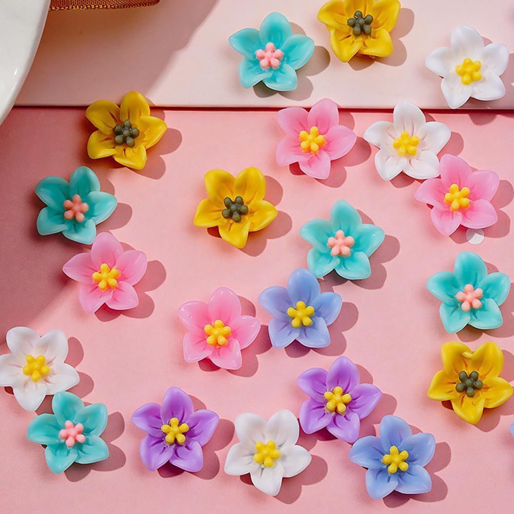Close up of colorful 3D rose and camellia resin charms for nails
