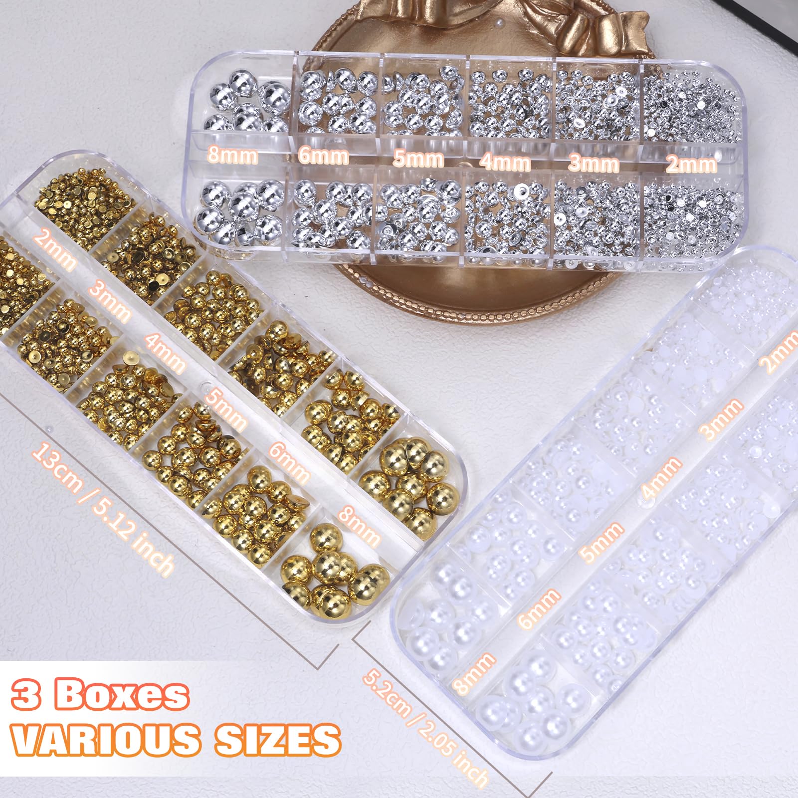 Hand holding pickup pencil applying pearl to nail art design