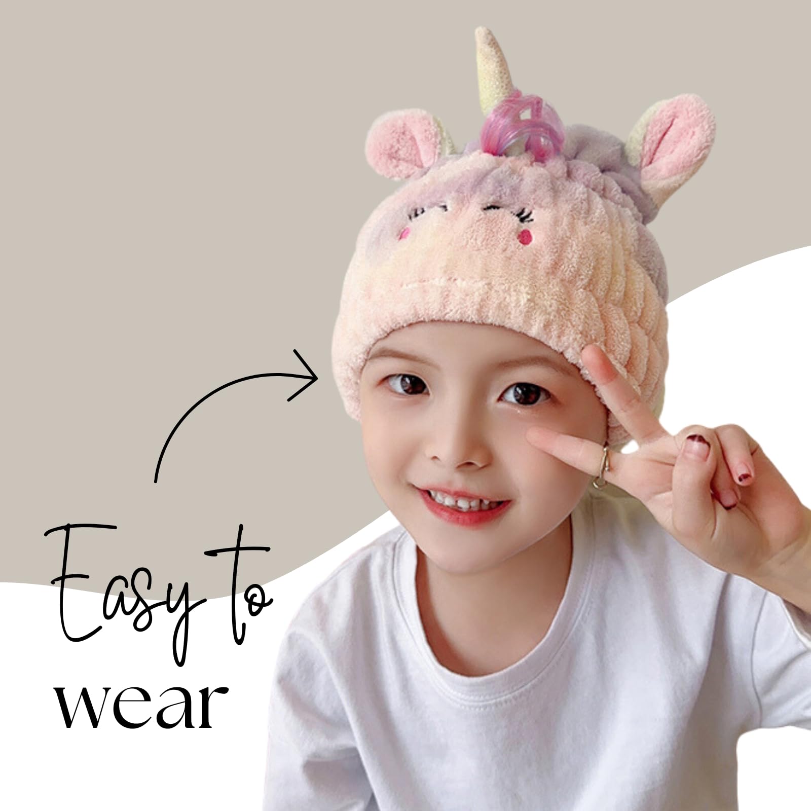 Soft absorbent kids hair drying cap with unicorn horn detail