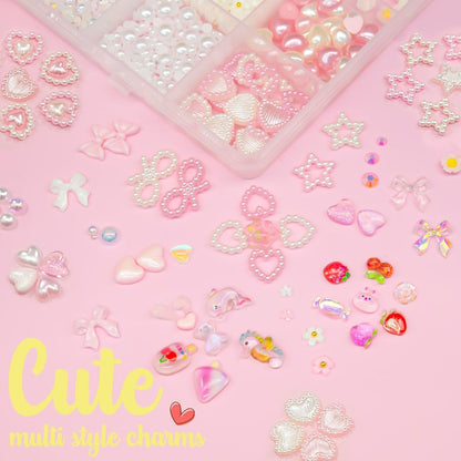 Selection of Y2K style fruit and star nail decorations