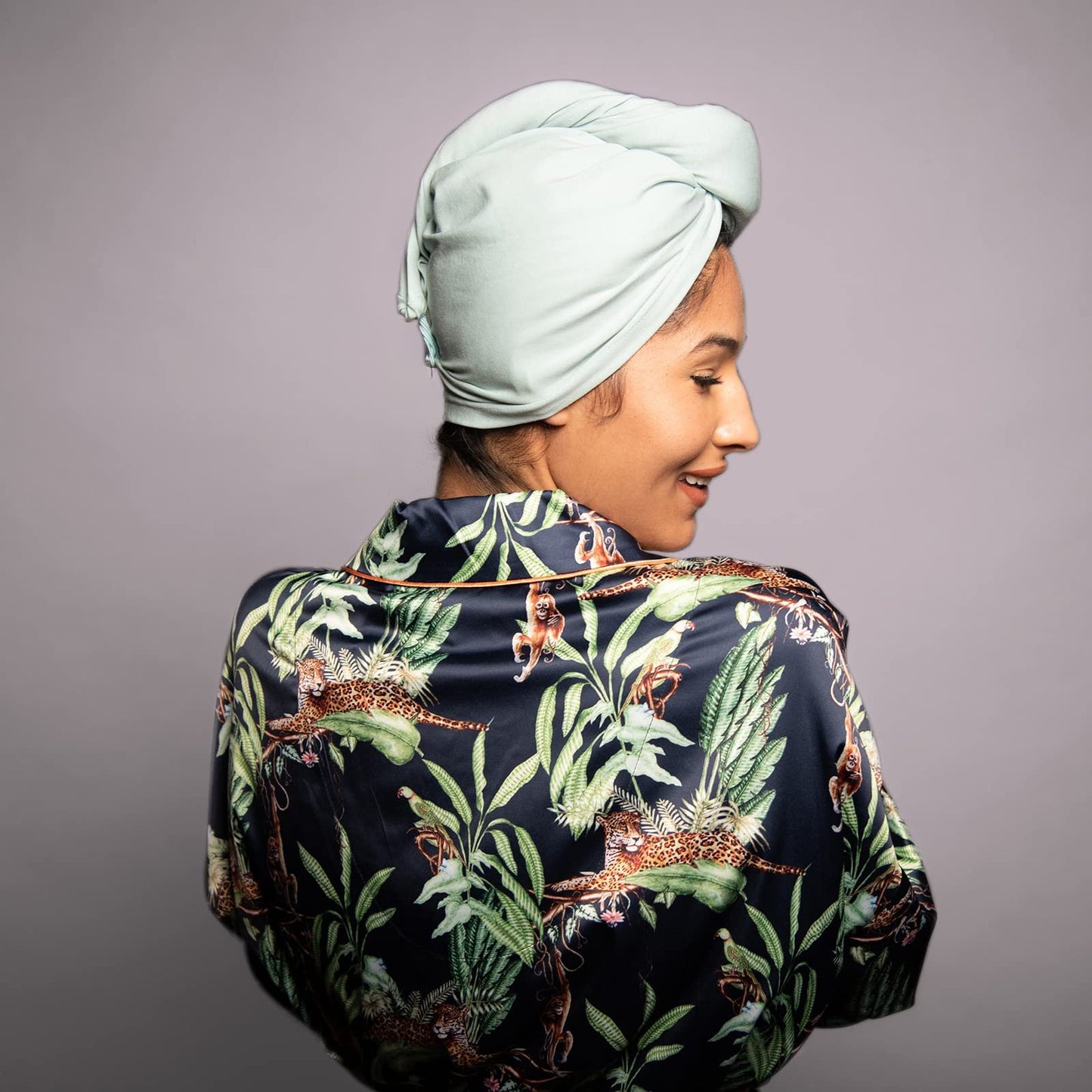 Sage and pink hair drying turbans in packaging