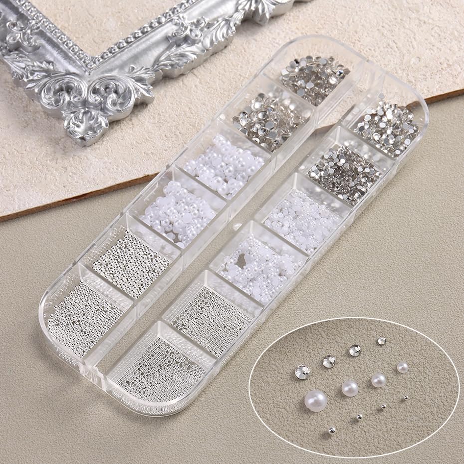 Close up of white half round pearl nail art decorations