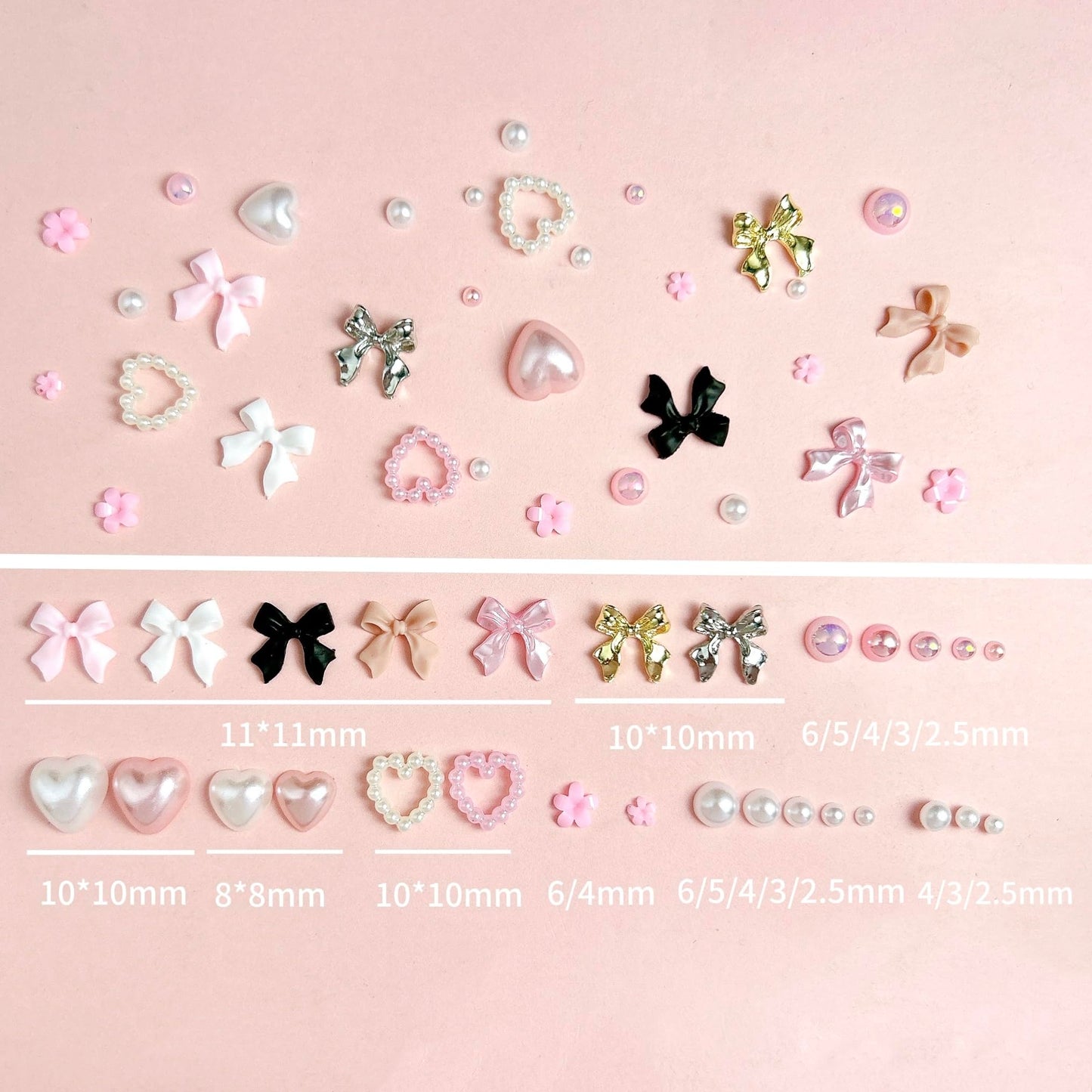Hand model showing manicure with 3D nail charms applied