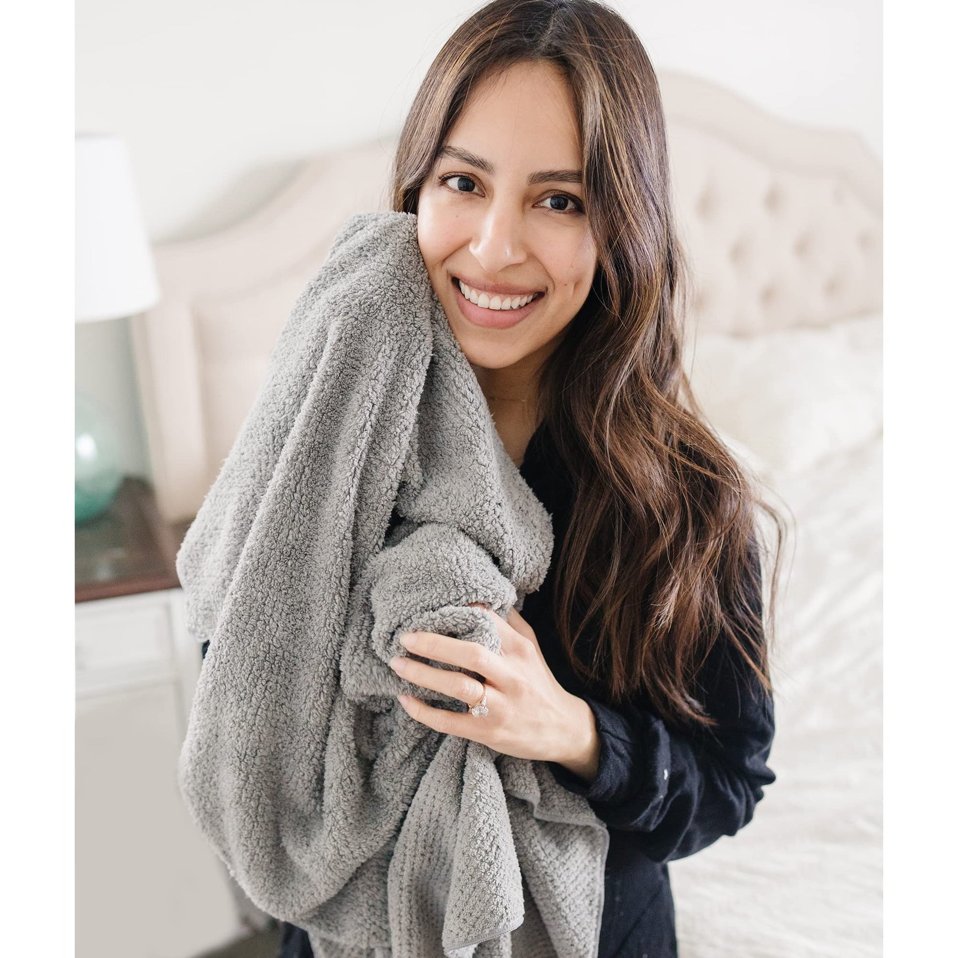 Instructions showing how to secure hair towel with elastic loop