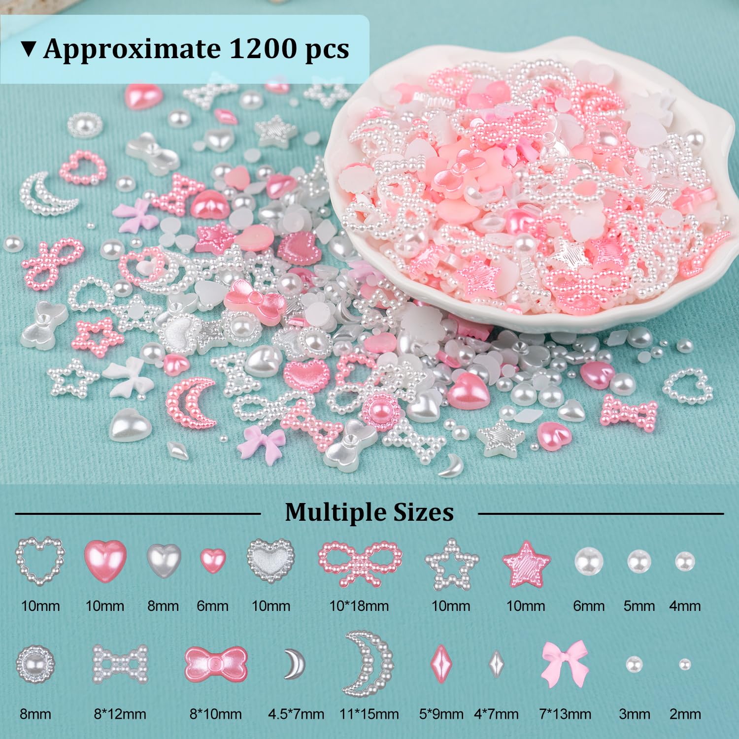 Close up of heart star and bow nail art embellishments