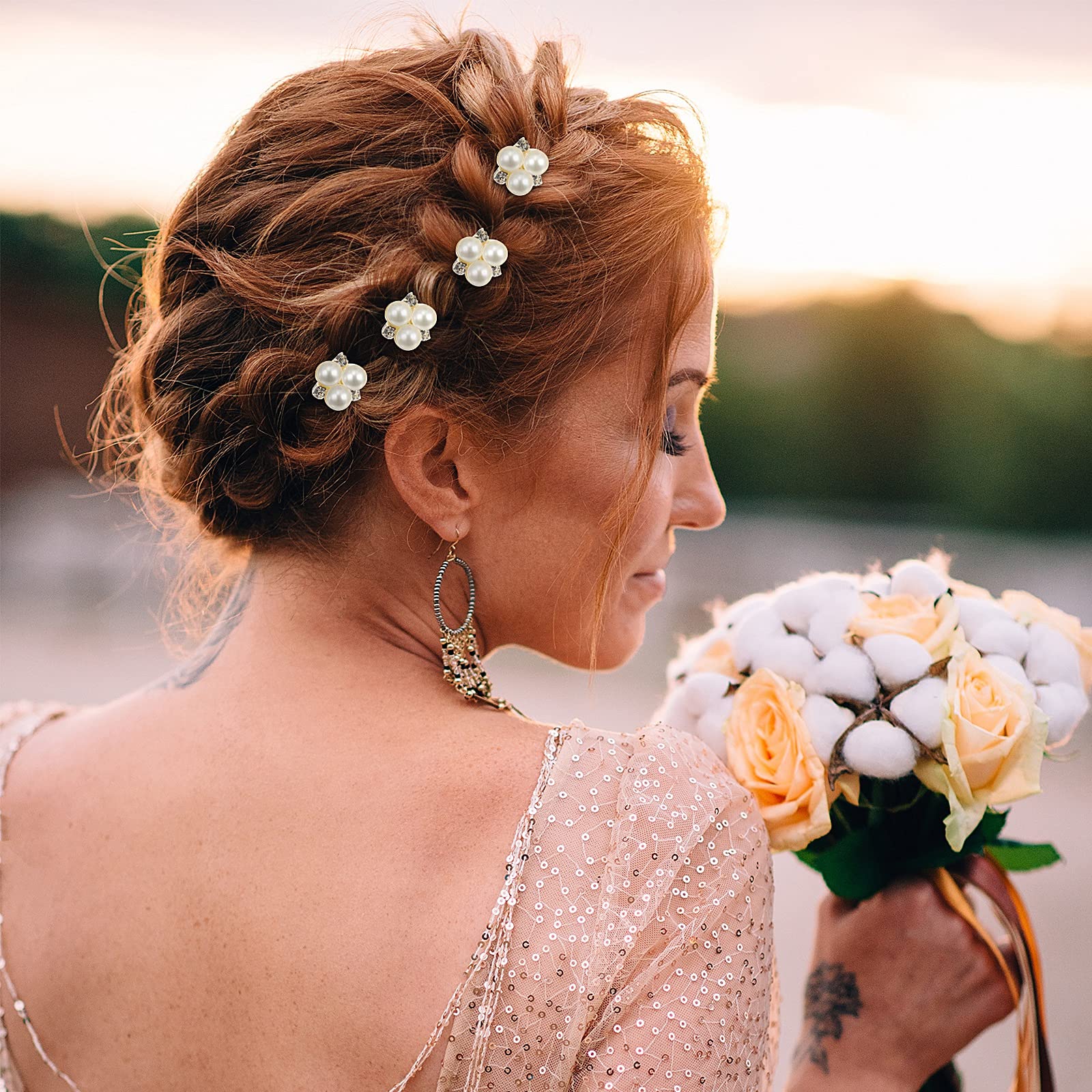 Close up view of the gold plated U shaped bridal bobby clips with elegant gemstone embellishments
