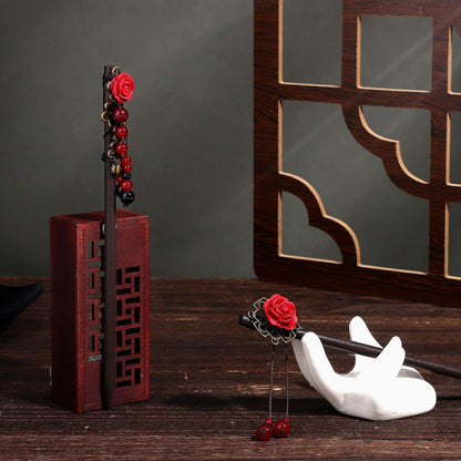 Dremisi retro style wooden hair sticks with delicate hanging beads showcasing authentic traditional Asian aesthetics.