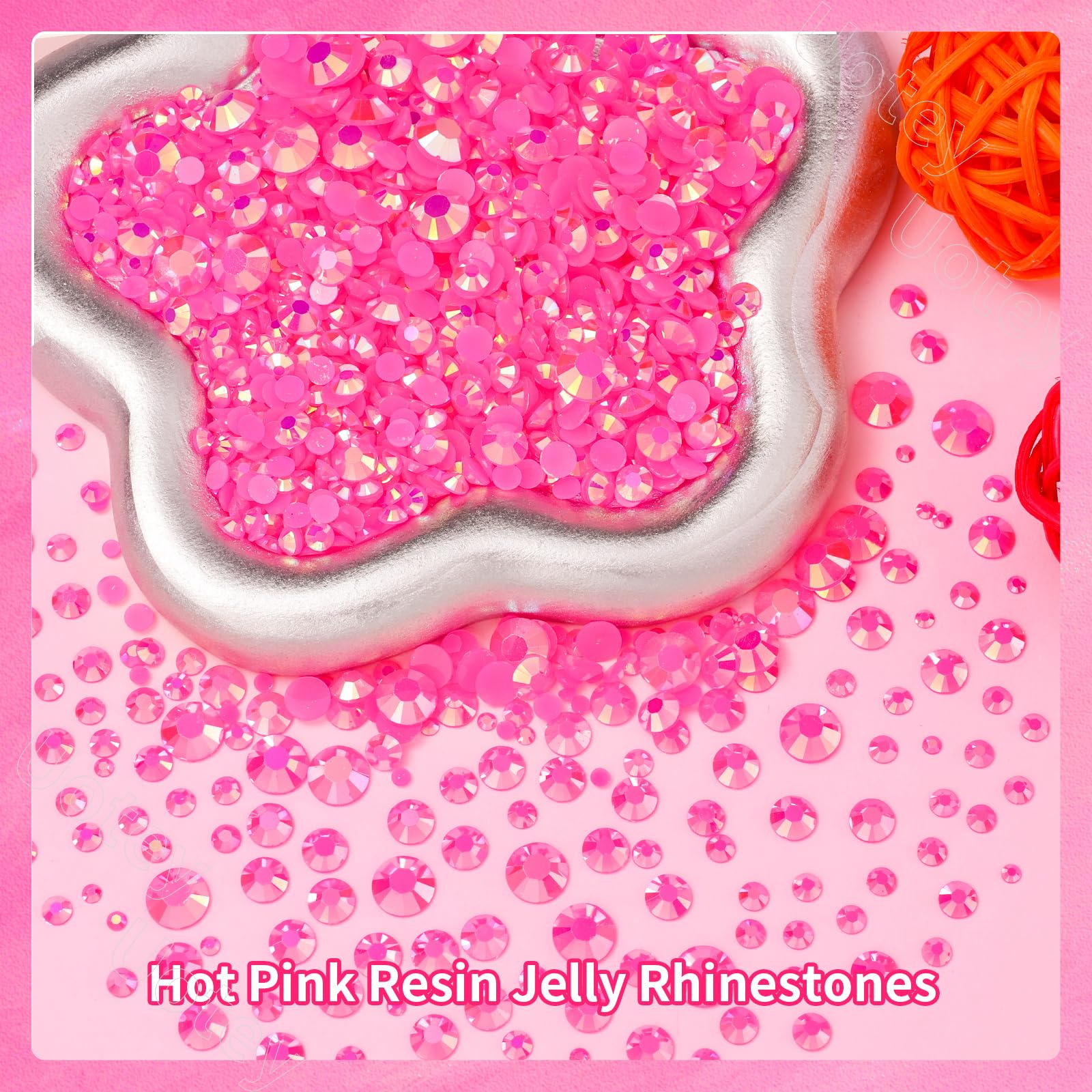 Hot pink flatback rhinestones arranged for nail art and decoration