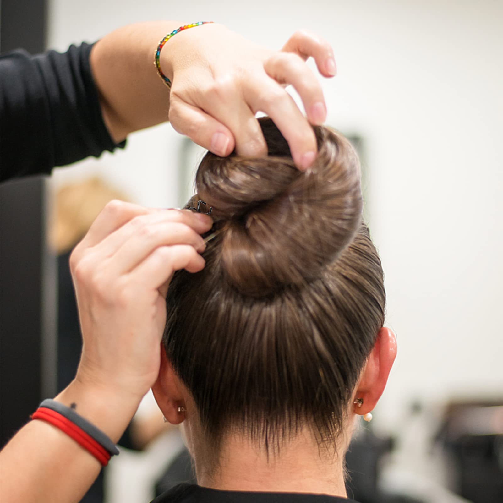 Iron alloy spiral bobby pins demonstrating strong hold capability for thick hair