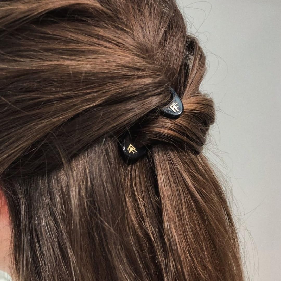 Close up shot of the ergonomic design and signature logo on the fiona franchimon hair accessory
