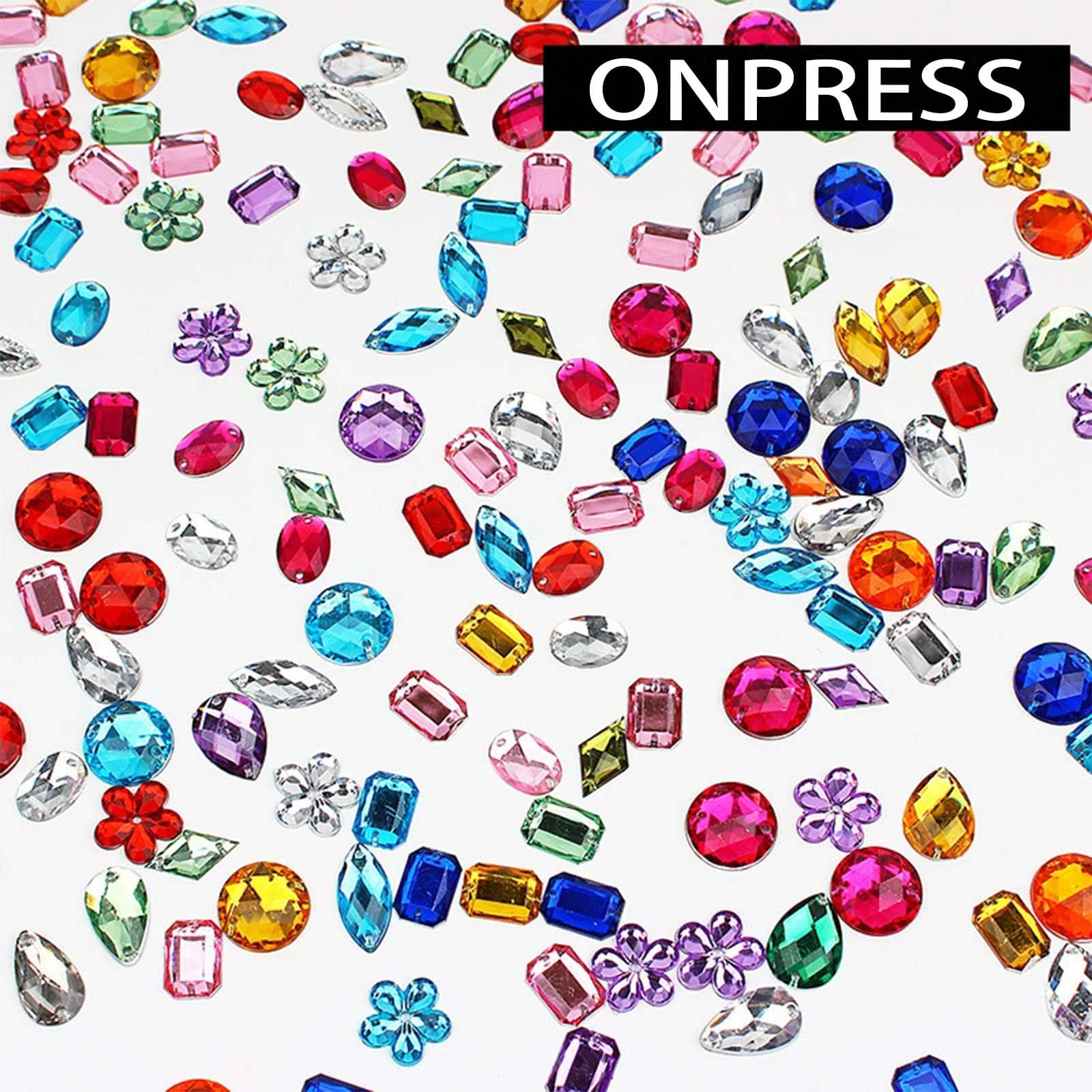 Close up of colorful 3D heart and star nail charms