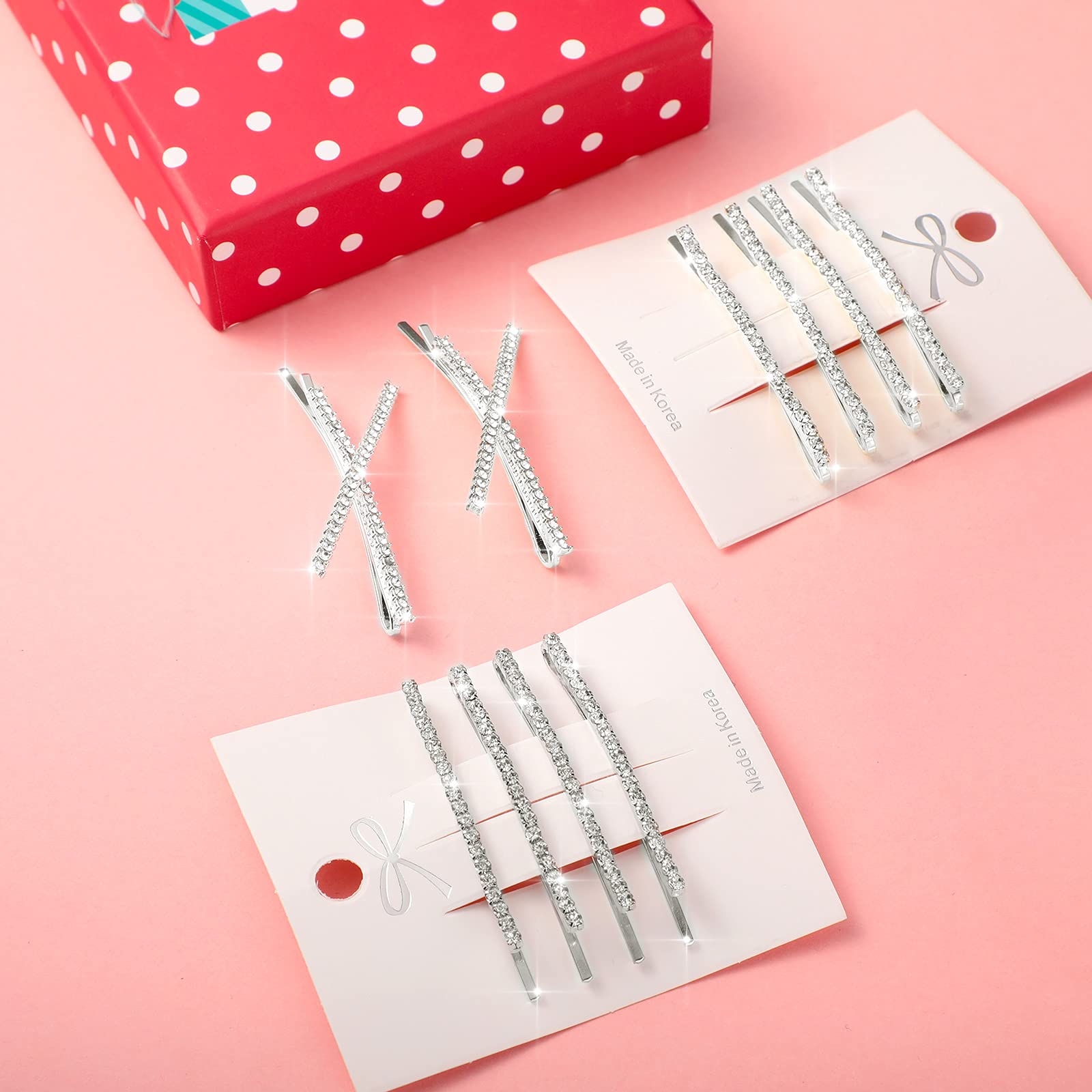 Side view of elegant shiny metal X shaped hair barrettes