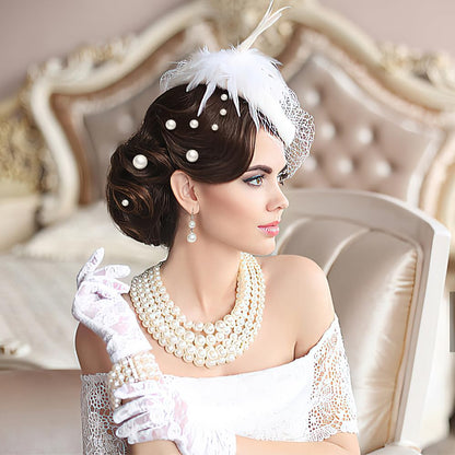 Assorted white pearl hair clips with durable gold metal forks suitable for festive occasion styling.