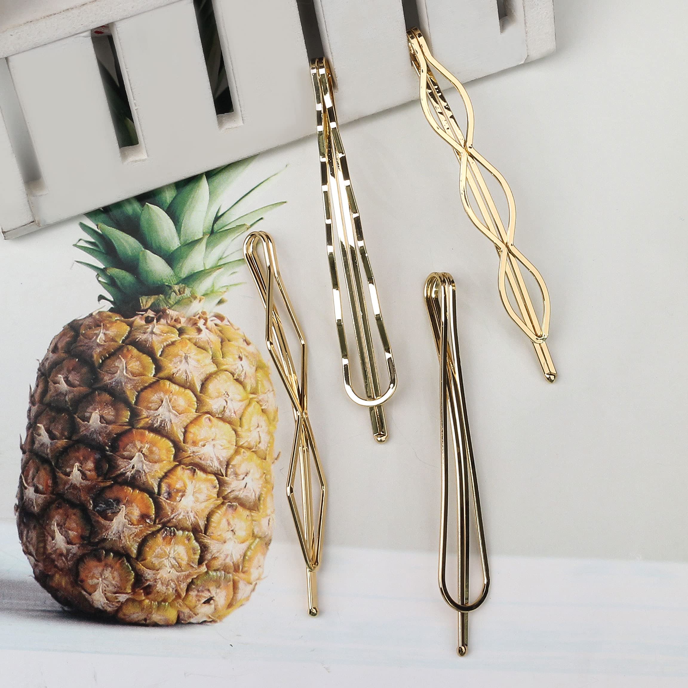 SUMAJU elegant gold metal bobby pins demonstrating secure snap-on mechanism for minimalist hair styling