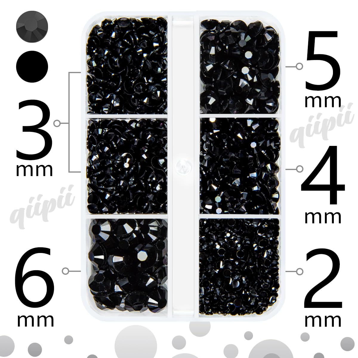 Hand holding tweezers applying black resin gems to nail art
