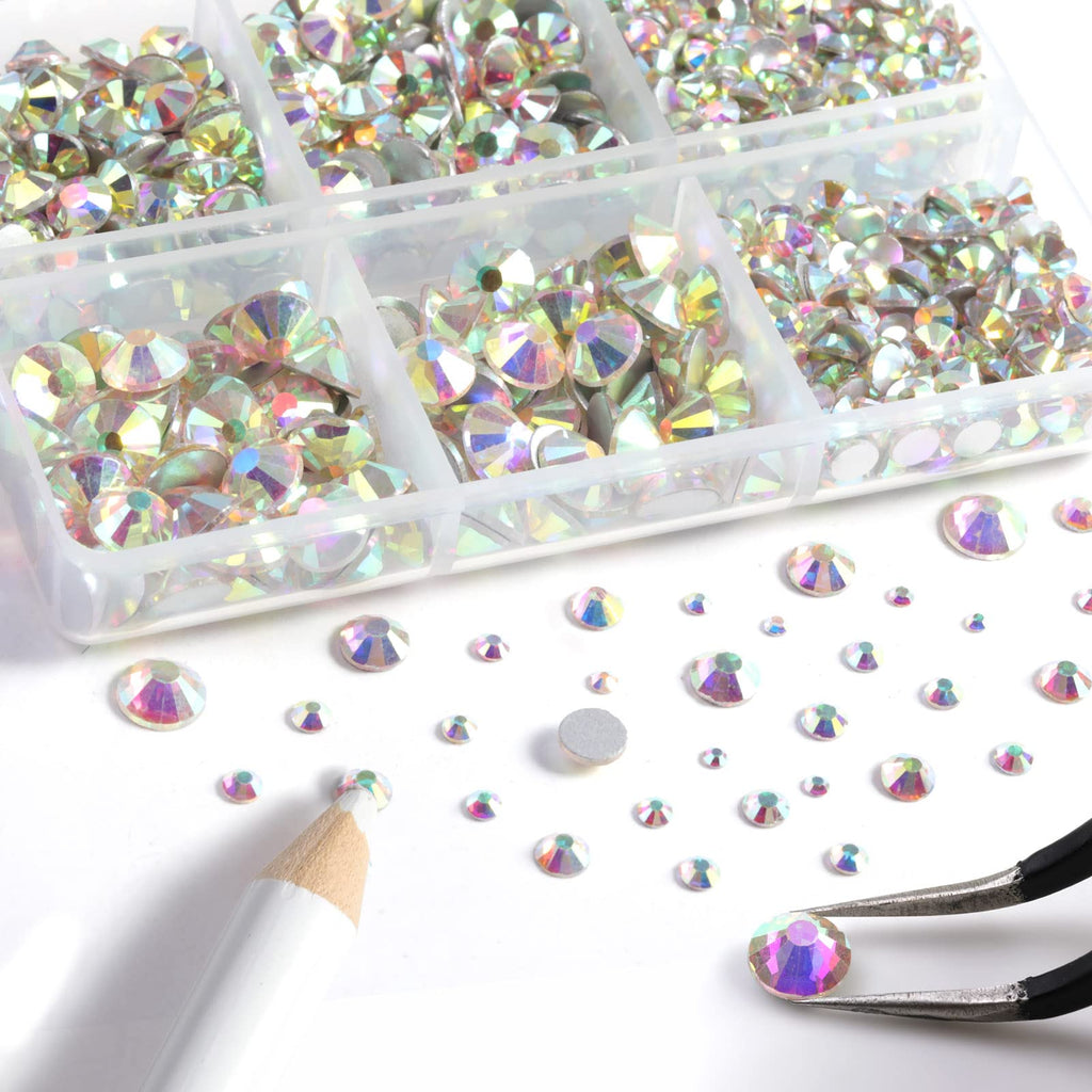 Close up of mixed size glass rhinestones in dual storage boxes