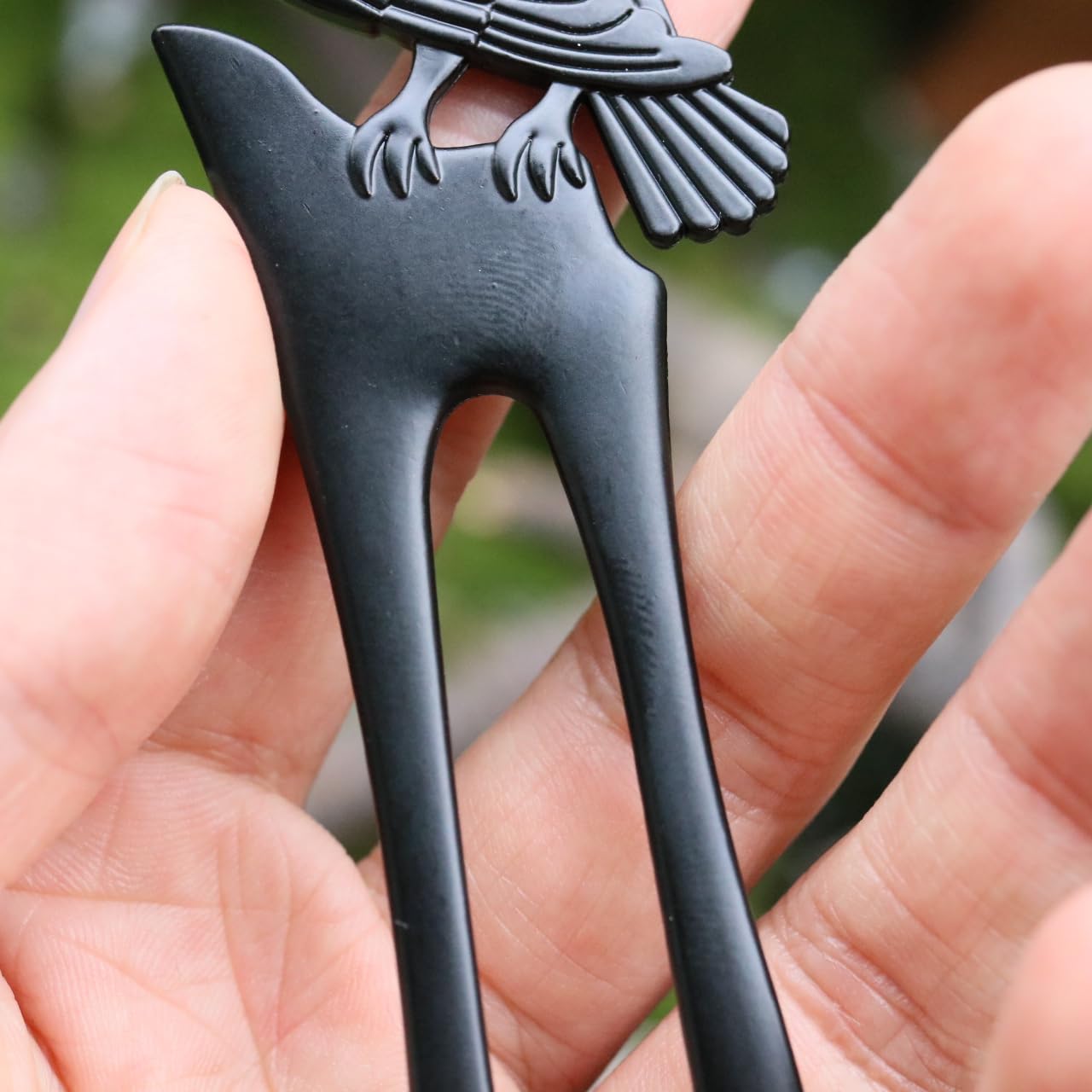 Hypoallergenic Nami coated black Wicca witch hair prongs closely detailed