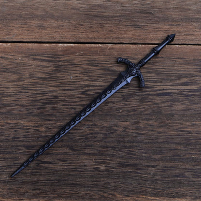 Durable zinc alloy metal sword styling pin being held to demonstrate the sturdy thickness and premium quality