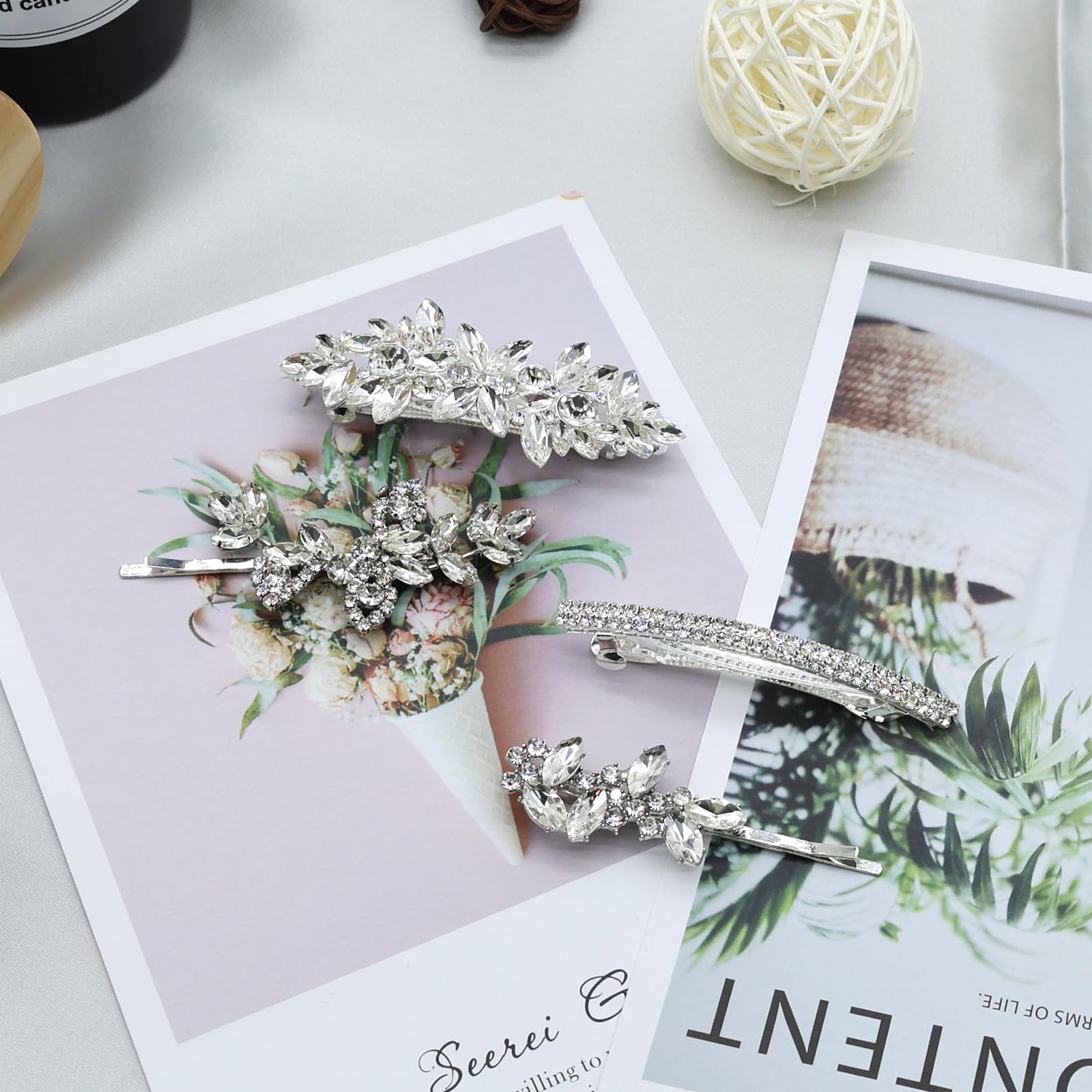 All four pieces of the Mulzile silver leaf rhinestone bridal hair accessories laid out together.