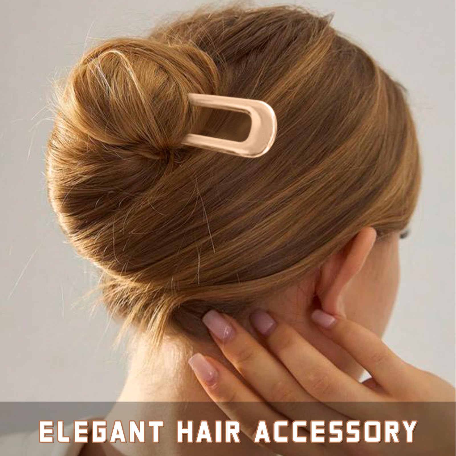 Close up of a five point five inch U-shaped metal pin for buns.