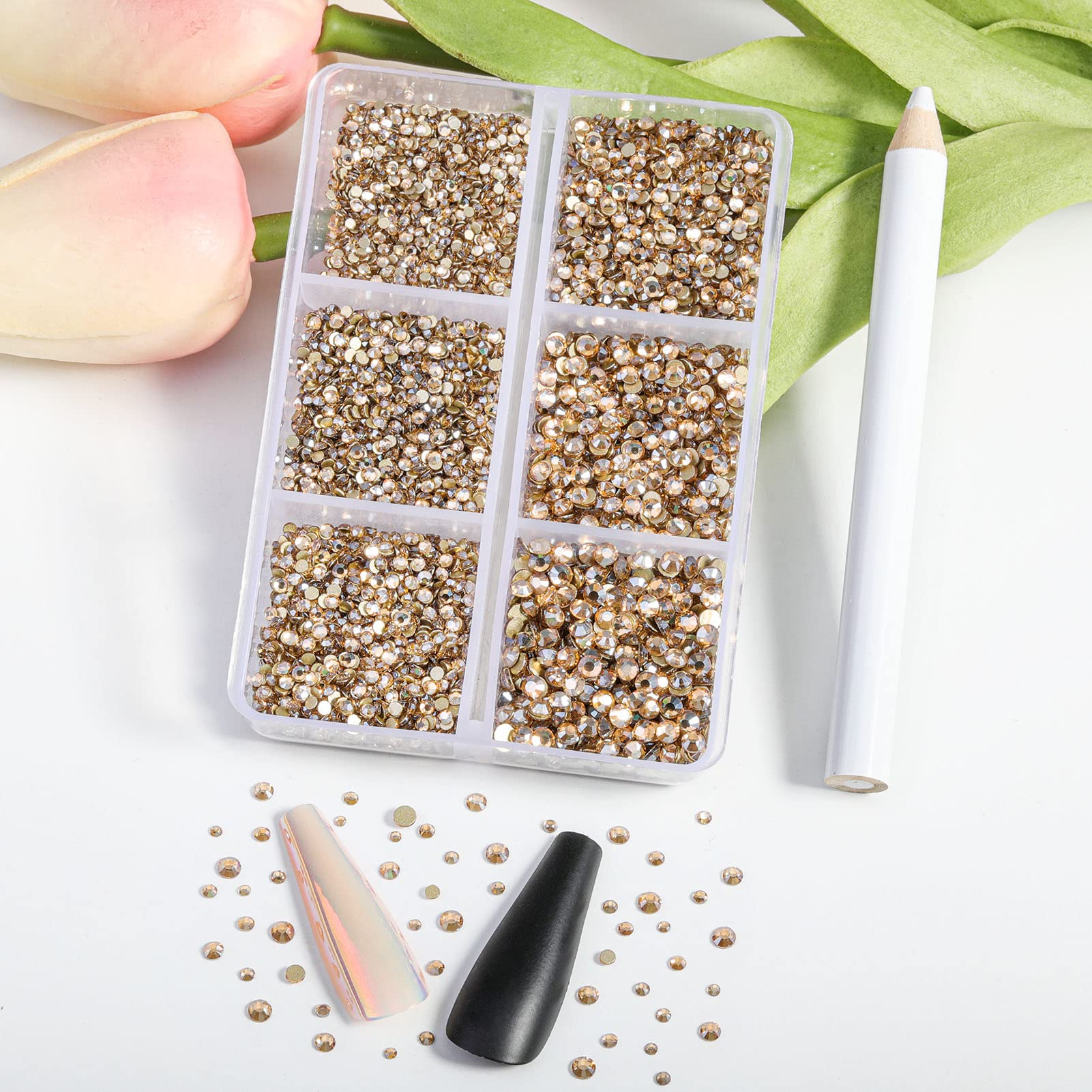 Close up of Beadsland golden shadow rhinestones with wax pencil